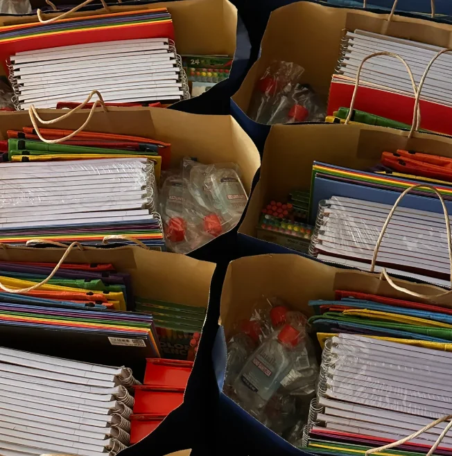 Notebooks and supplies packed for delivery