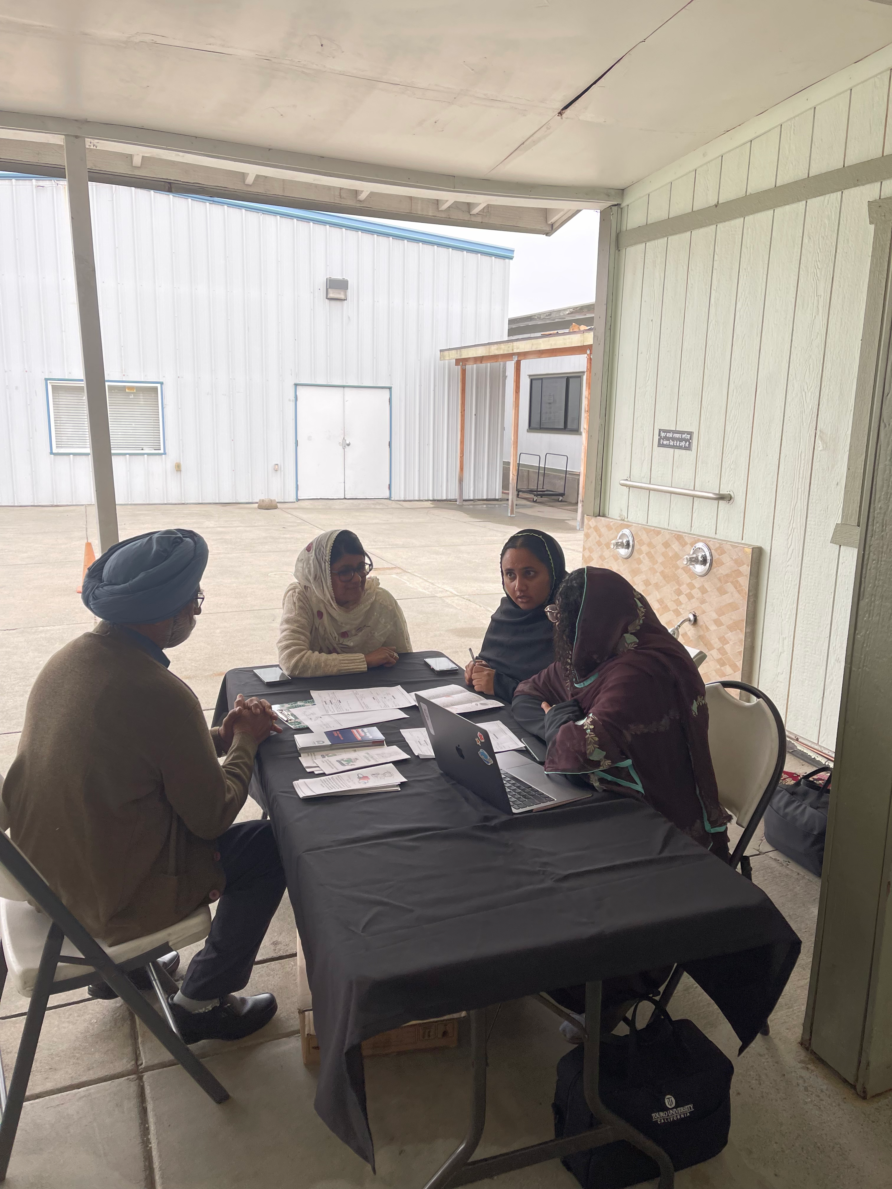 Healthcare volunteers providing patient education