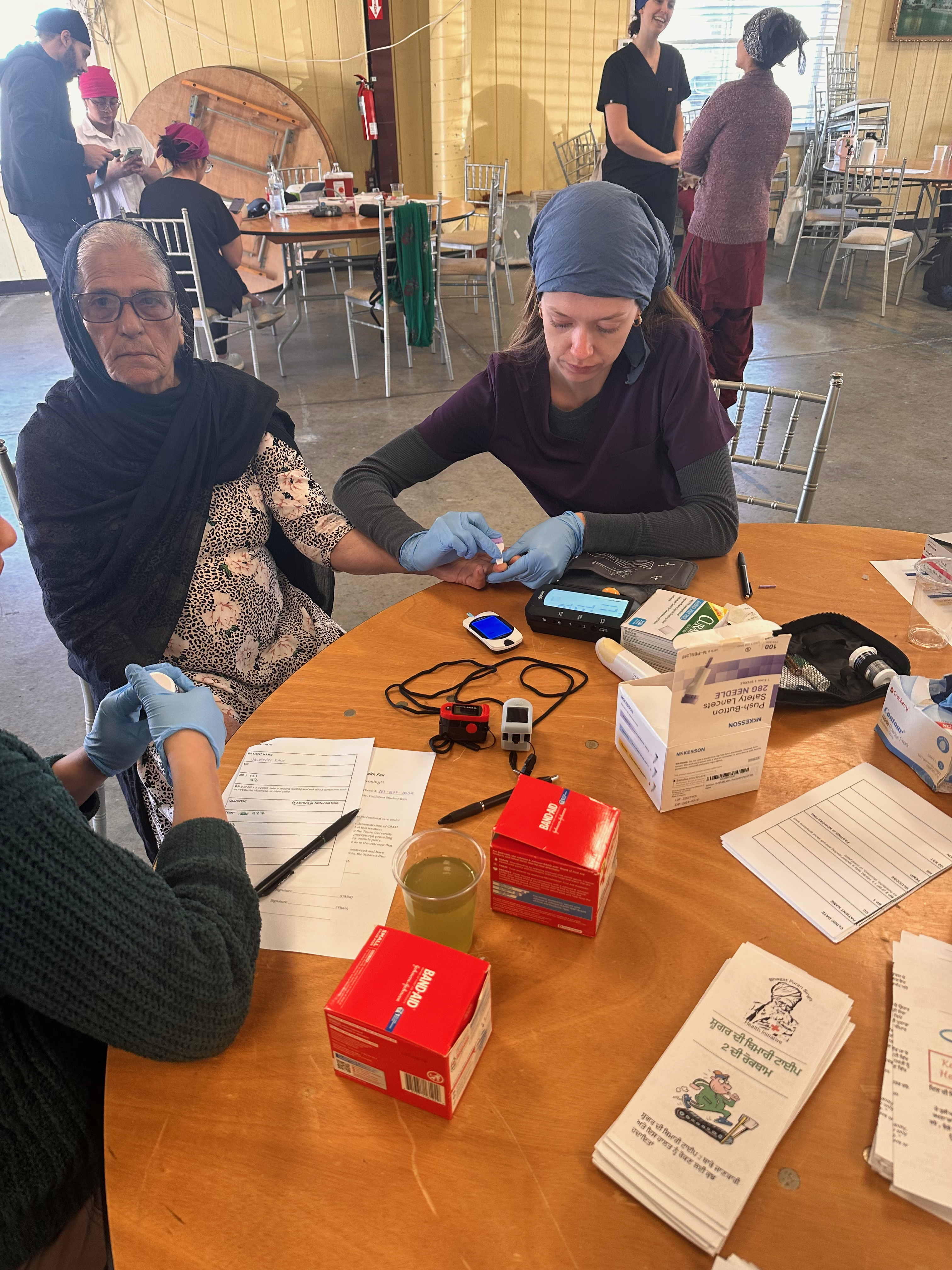 Volunteers working with community members